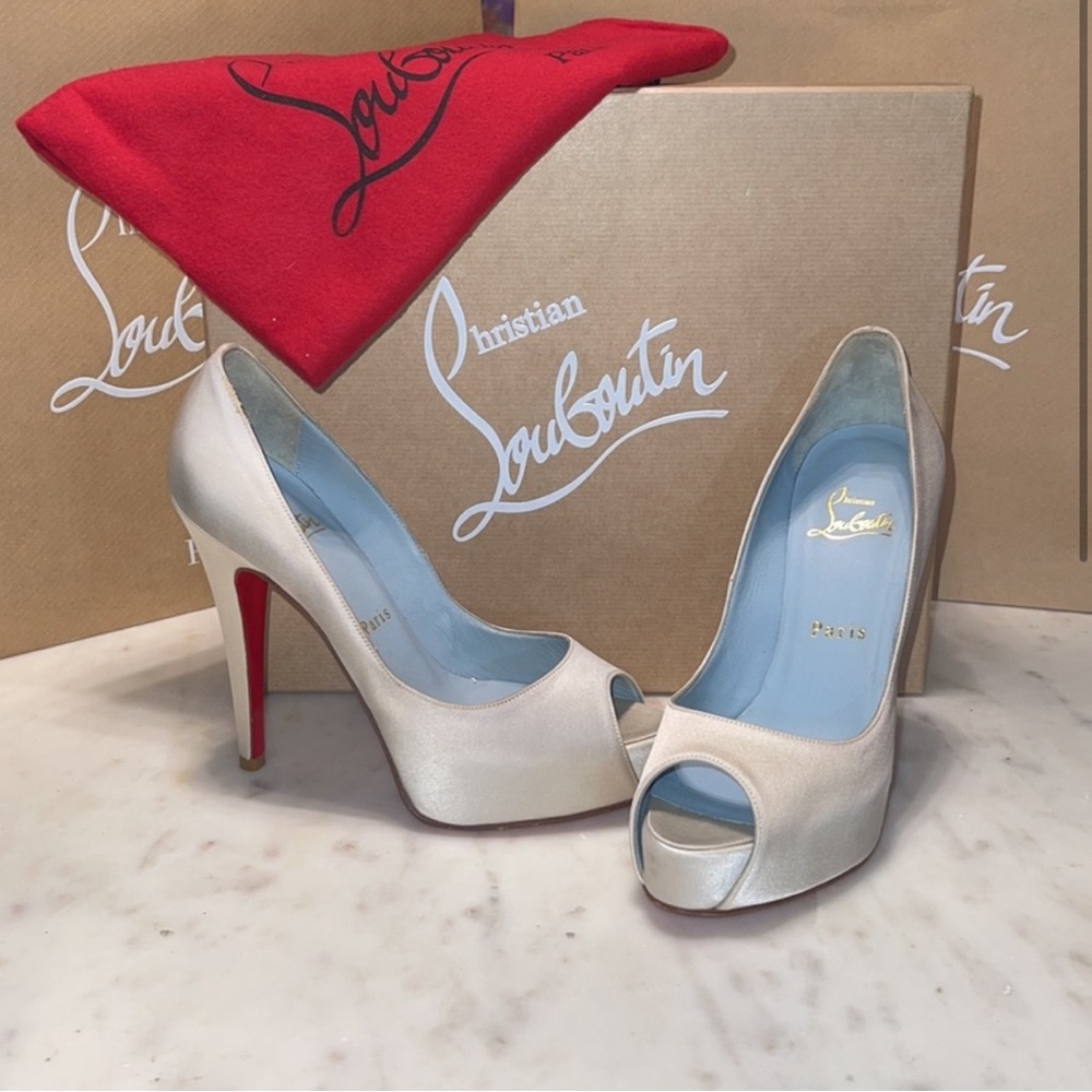 Christian Louboutin Cream Peep-Toe Platform Pumps with Red Soles